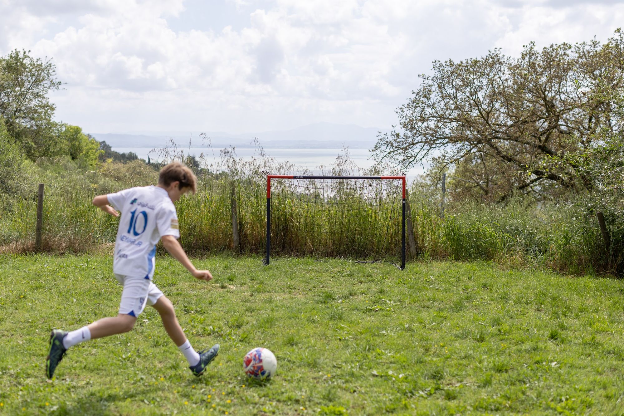 Open meadow below the olive grove, used for football and long walks