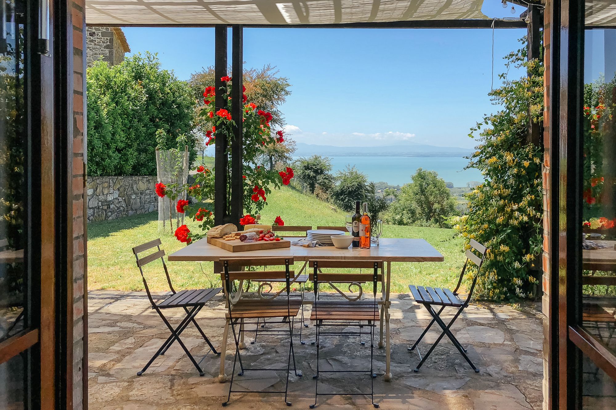 Terrace table looking out over the valley towards the lake