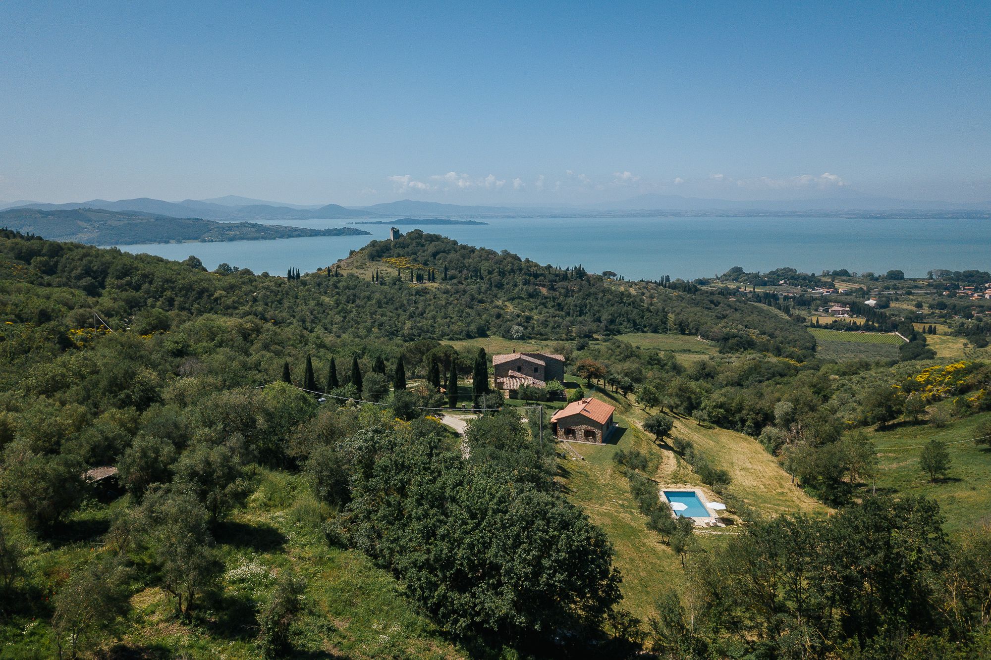 The villa from above, with Lake Trasimeno in the distance