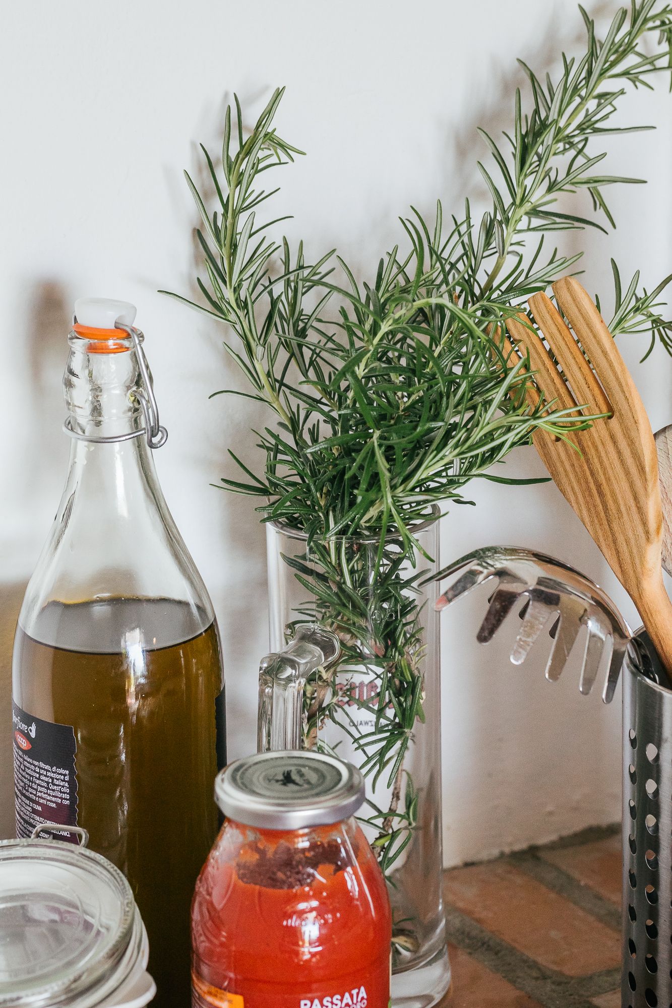 Local olive oil, rosemary and preserves in the kitchen